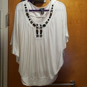 Women's flowy jeweled cream shirt